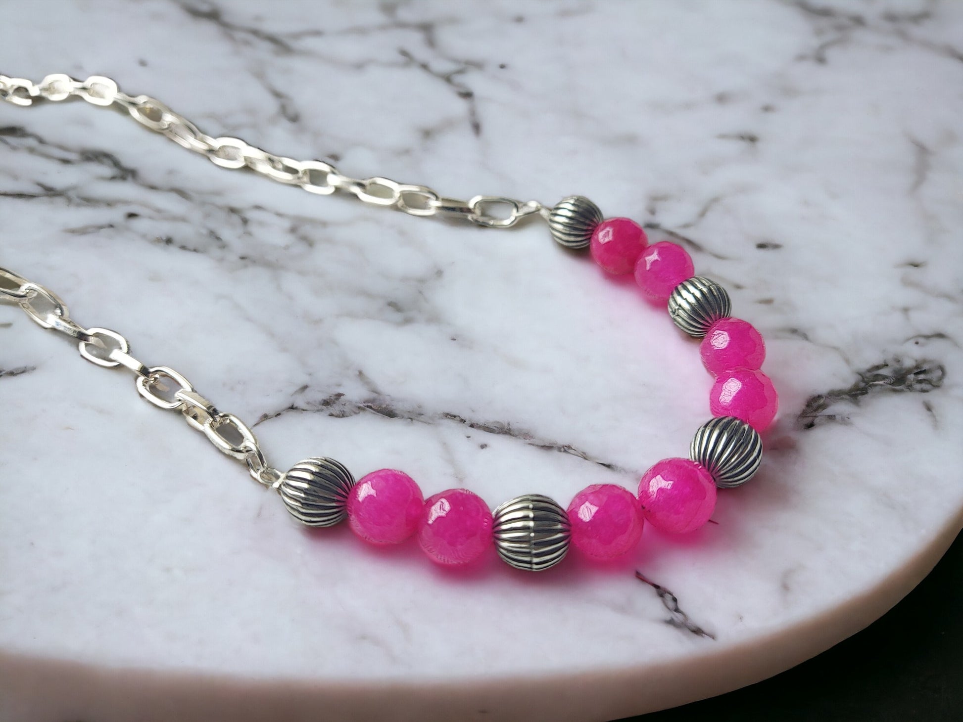 Enhance your style with our Pink Agate Beads Simple Jewelry. Made with anti-tarnish silver chain, this delicate piece is sure to add a touch of elegance to any outfit. Natural, beautiful pink agate beads make this jewelry both unique and versatile. Elevate your look with our simple yet stunning design.