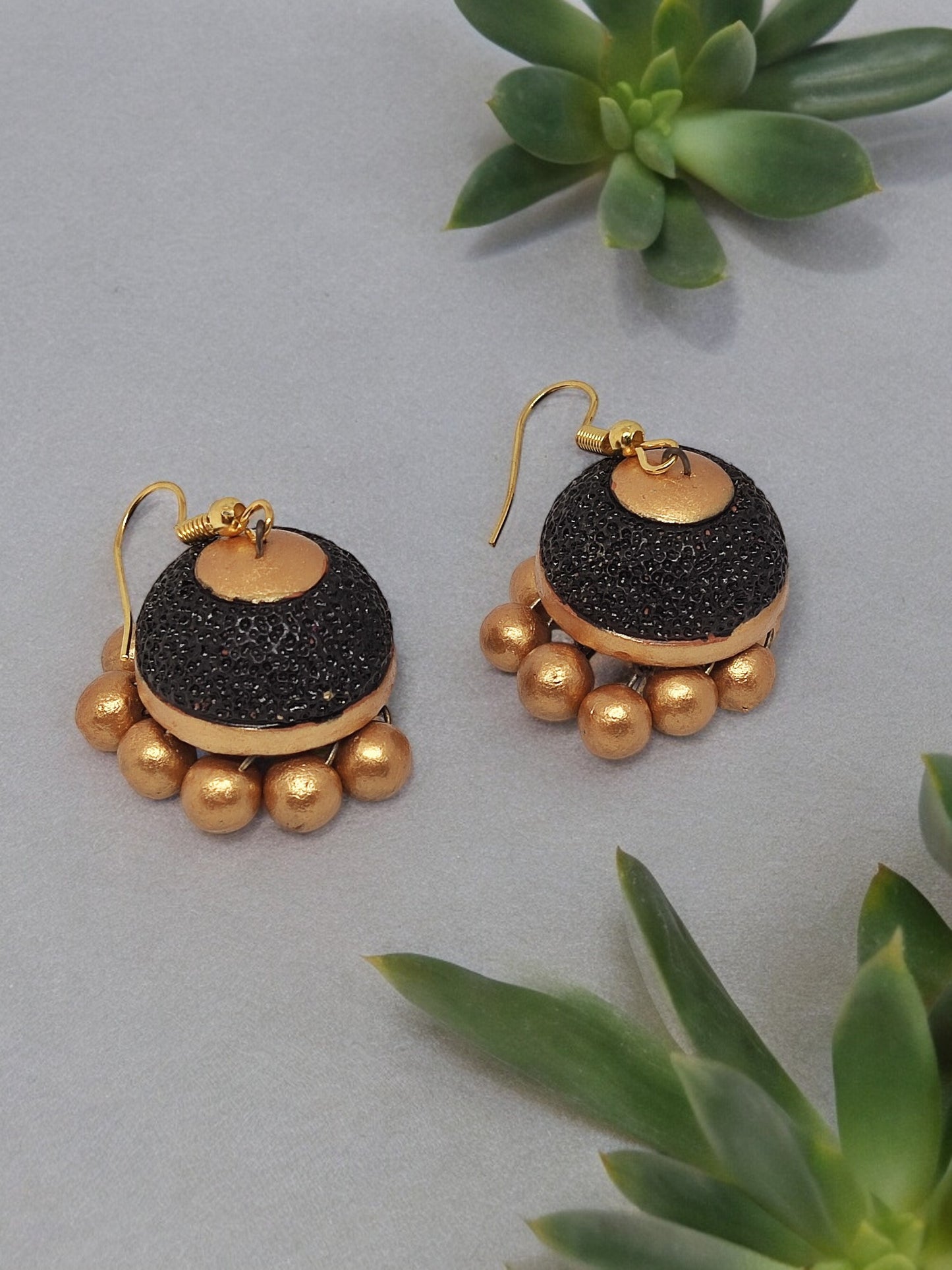 Rudraksham Jhumka Black and gold in color