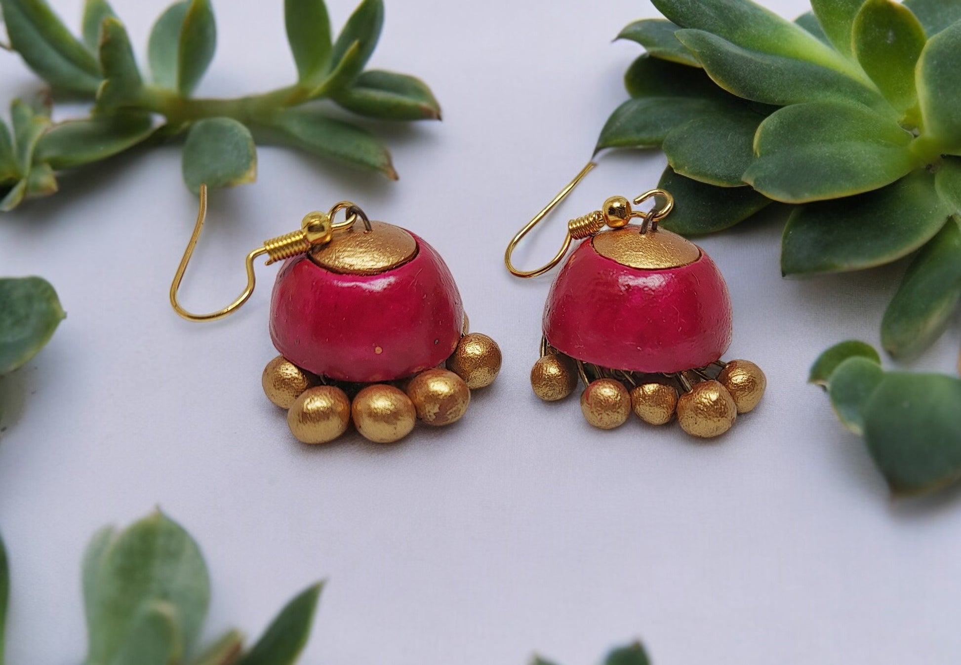 Inspired from nature &amp; crafted from natural earthen clay, terracotta jhumkis are earthen baked clay handmade earrings. We at Anusangi Collections provide color optimization as per your requirement.