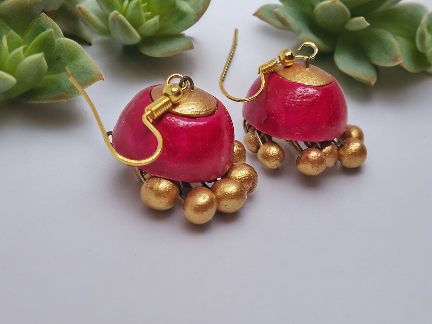 Inspired from nature &amp; crafted from natural earthen clay, terracotta jhumkis are earthen baked clay handmade earrings. We at Anusangi Collections provide color optimization as per your requirement.