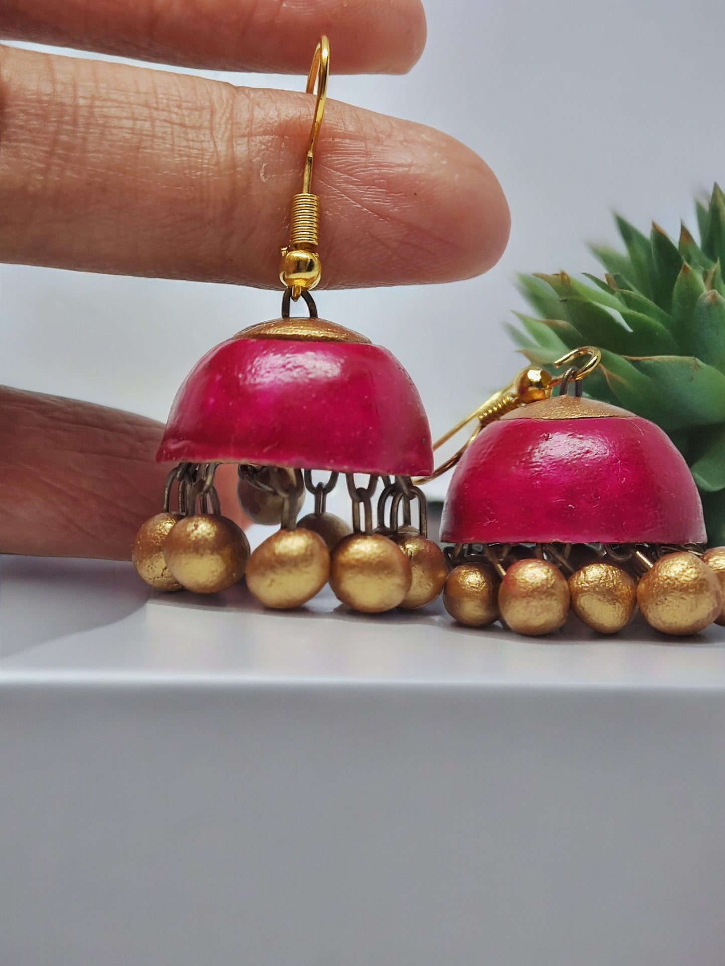 Inspired from nature &amp; crafted from natural earthen clay, terracotta jhumkis are earthen baked clay handmade earrings. We at Anusangi Collections provide color optimization as per your requirement.