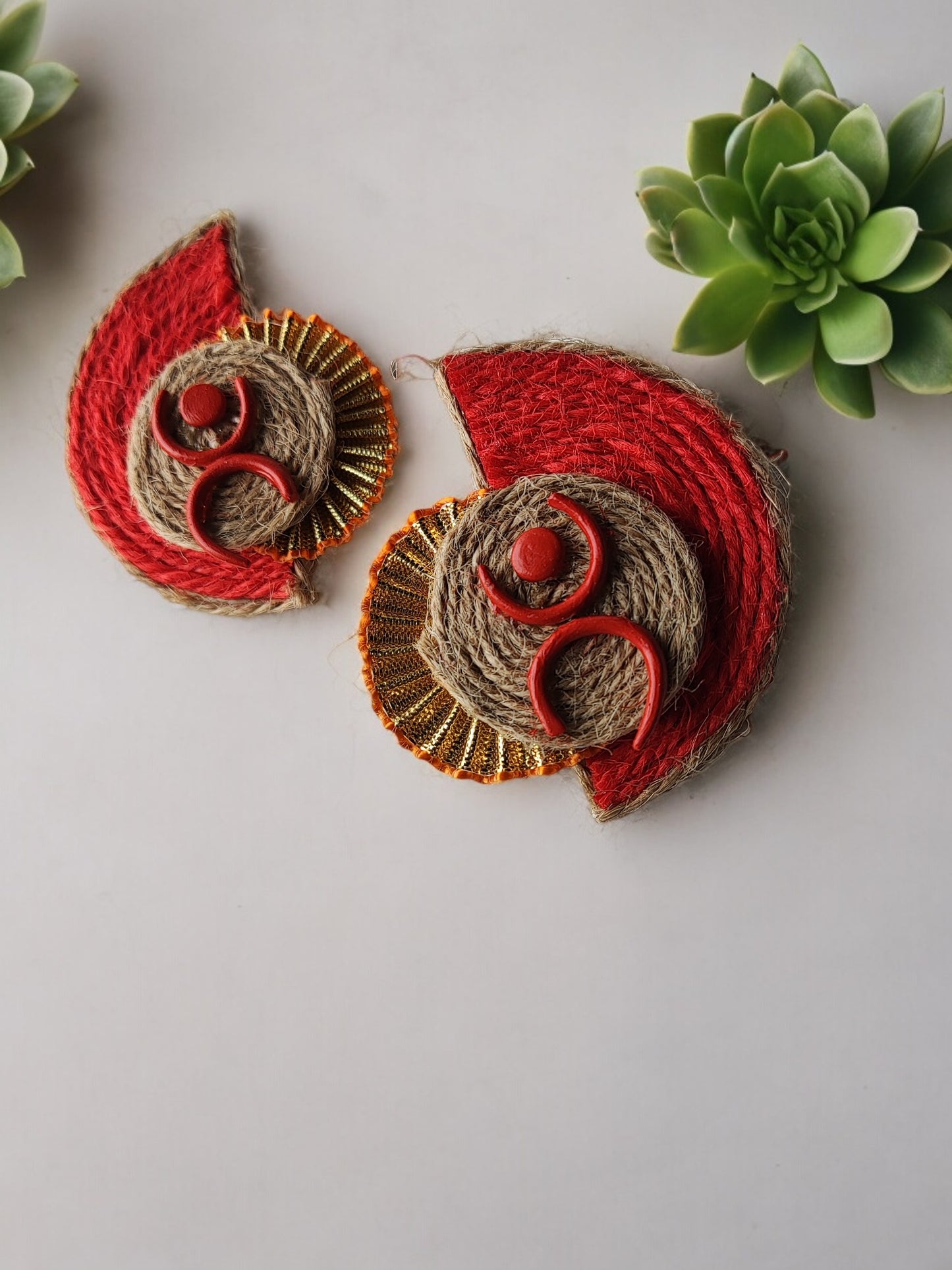 <p data-mce-fragment="1">Introducing Aanshi Fabric Earrings, the perfect blend of simplicity and style. Handmade with delicate jute thread and mouldit clay, these earrings offer a light weight feel and a sophisticated look. Elevate any outfit with these stylish and exclusive earrings.</p>