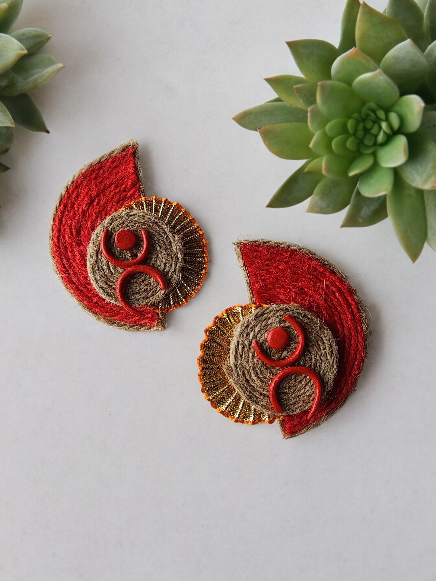 <p data-mce-fragment="1">Introducing Aanshi Fabric Earrings, the perfect blend of simplicity and style. Handmade with delicate jute thread and mouldit clay, these earrings offer a light weight feel and a sophisticated look. Elevate any outfit with these stylish and exclusive earrings.</p>