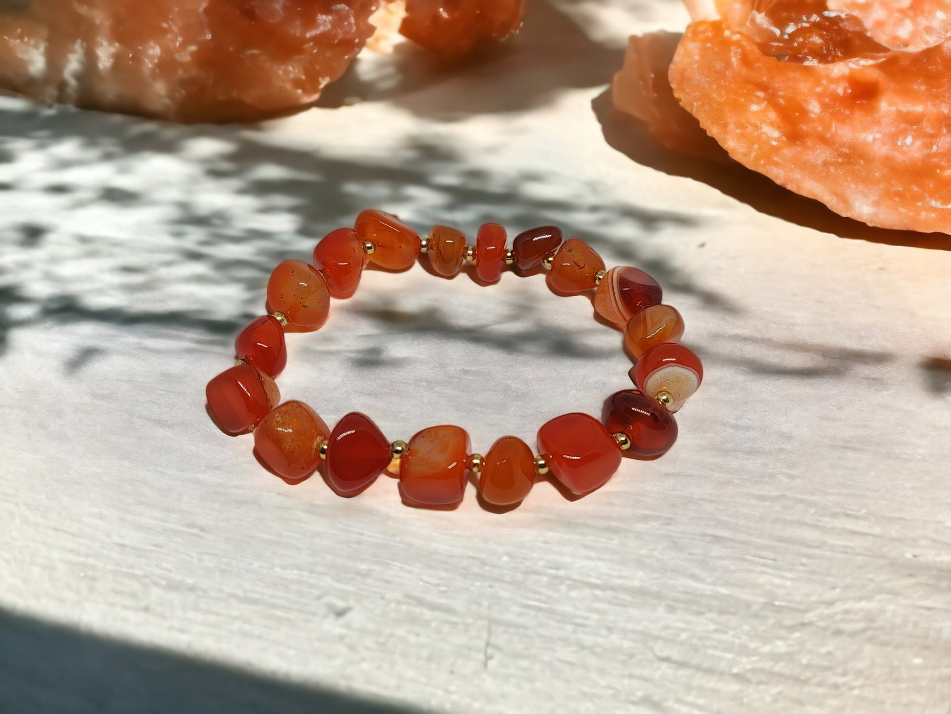 This expertly crafted Orange Nugget bracelet features genuine orange agate nugget beads for a stunning, natural look. With a variety of color options, this bracelet is a versatile accessory that will elevate any outfit. Experience the benefits of wearing beautiful and unique gemstones with this elegant bracelet.