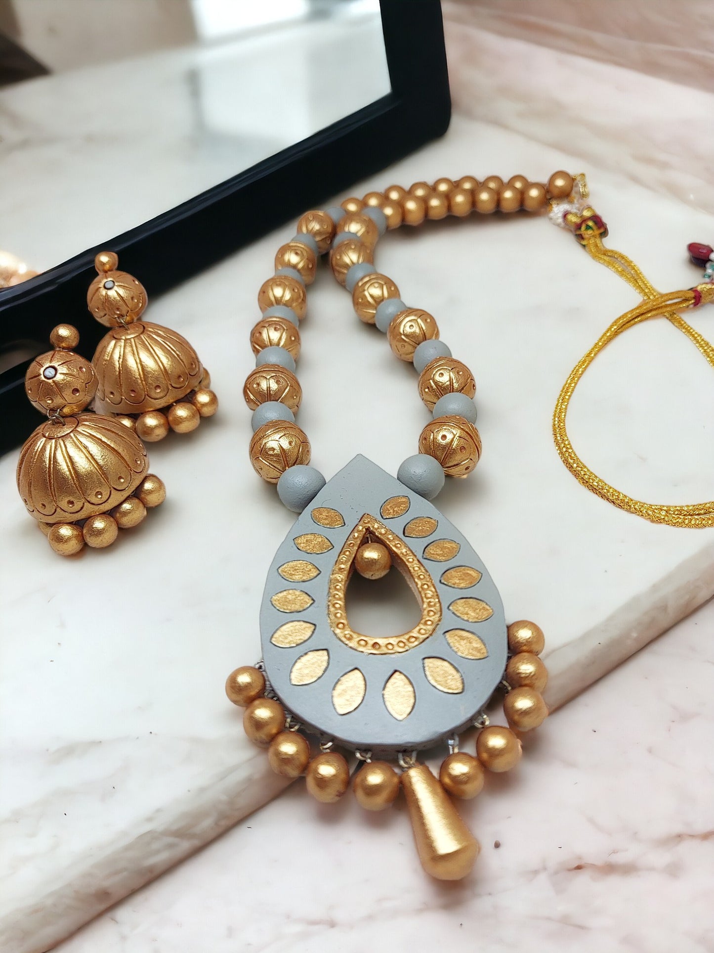 Grey and Gold Terracotta Jewelry set for women. Handcrafted and eco friendly set to pair with any ethnic wear