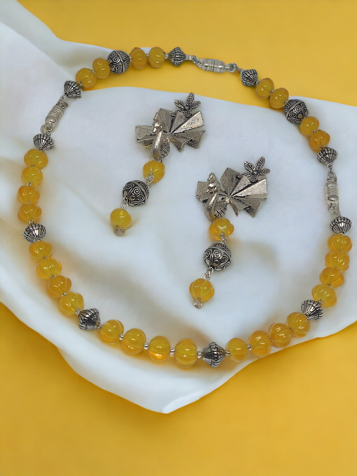 Arunima* yellow pumpkin beaded jewelry set. made with beads and magnets that makes jewelry easily changeable for any style and pattern