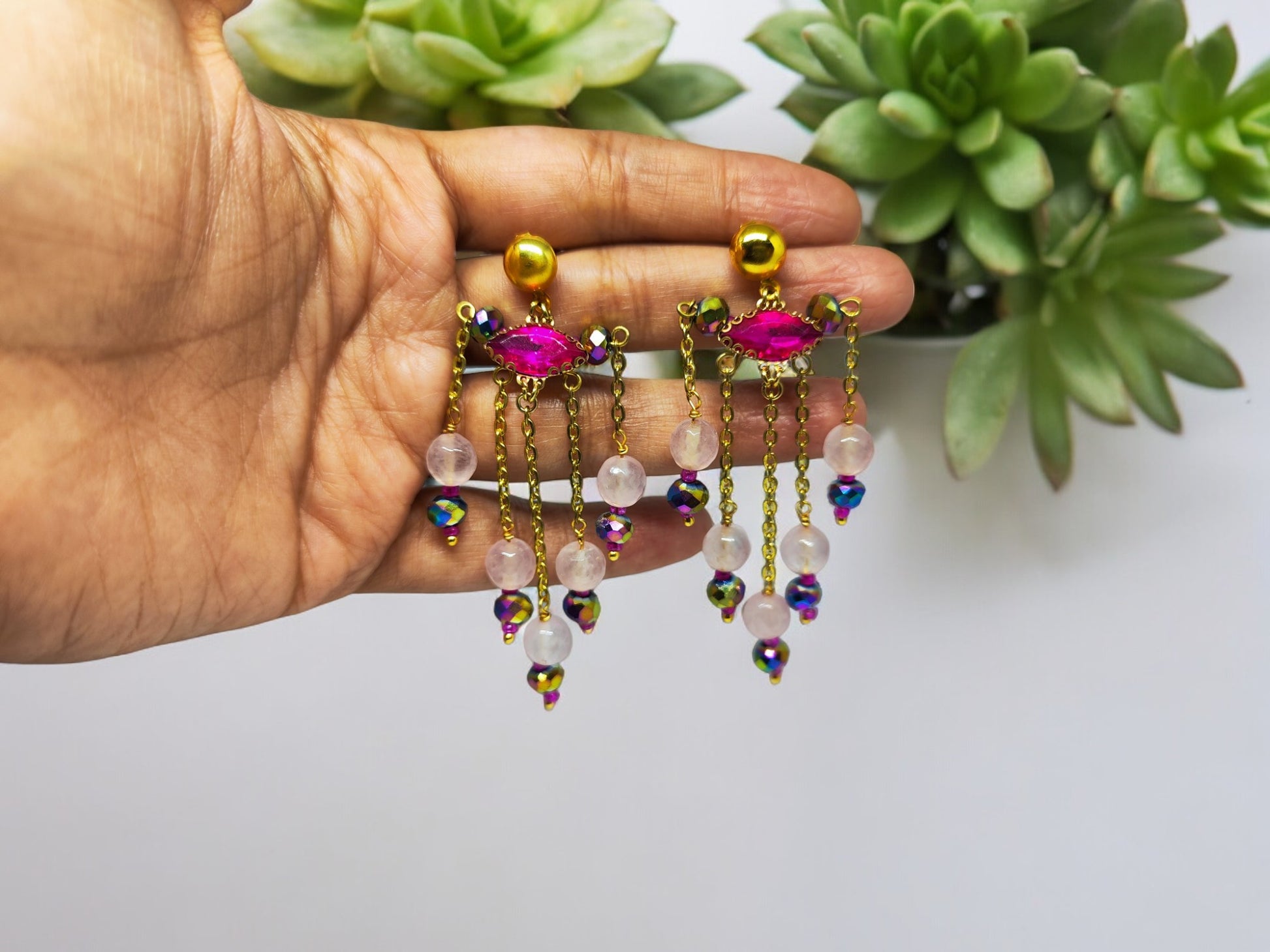 <p data-mce-fragment="1">Indulge in luxury with our Xiti Beaded Earrings. Handcrafted with intricate beadwork in a stunning pink and gold combination, these long earrings add a touch of sophistication to any outfit. Elevate your style and make a statement with these exclusive and elegant accessories.</p>