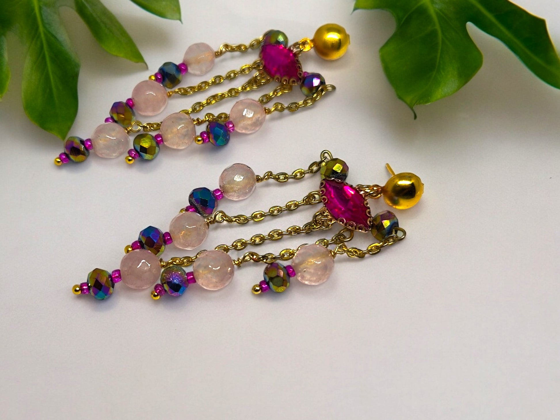 <p data-mce-fragment="1">Indulge in luxury with our Xiti Beaded Earrings. Handcrafted with intricate beadwork in a stunning pink and gold combination, these long earrings add a touch of sophistication to any outfit. Elevate your style and make a statement with these exclusive and elegant accessories.</p>