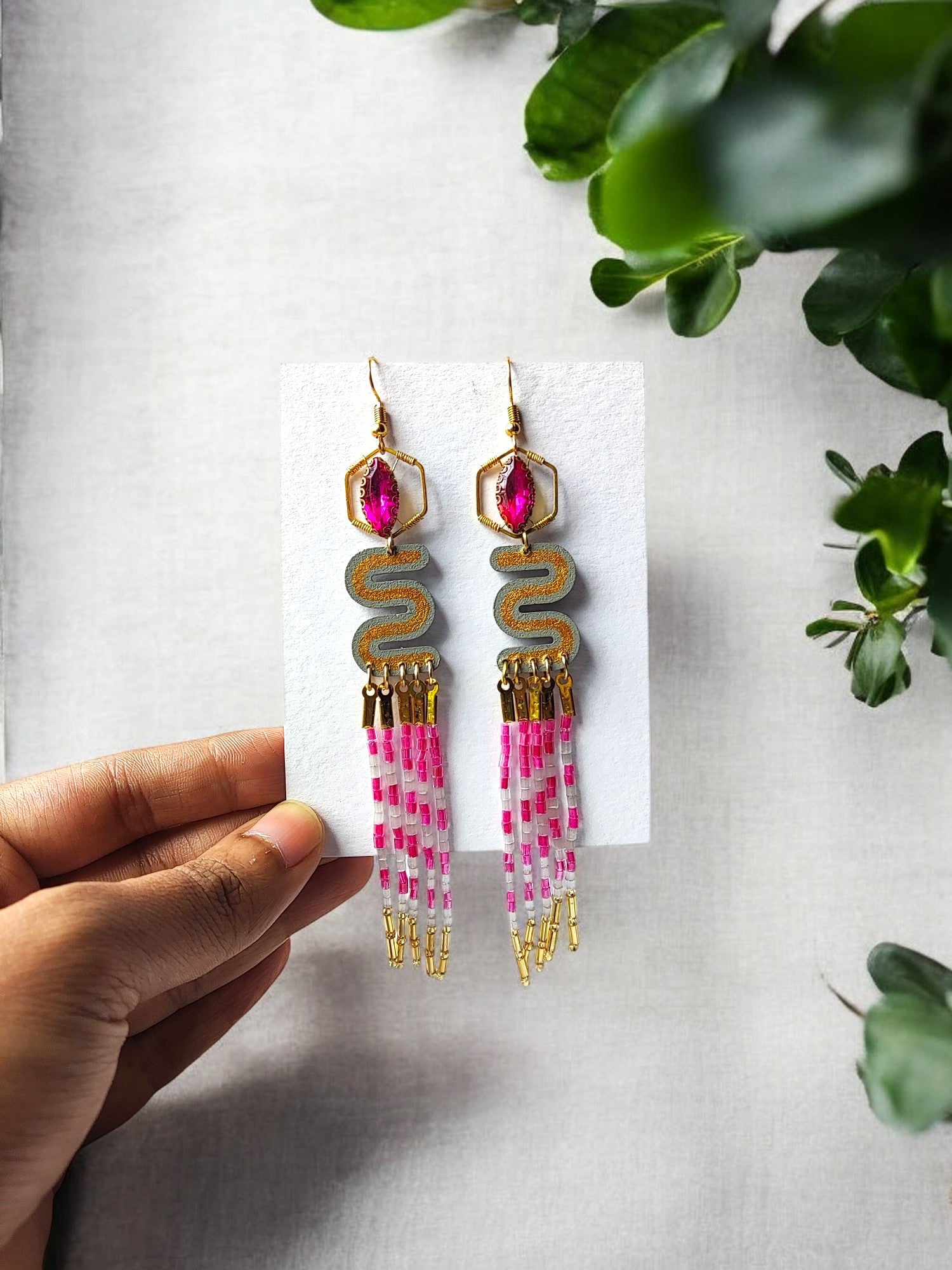 Elevate your style with the Agatha Long Beaded Earrings. Crafted with intricate beading, these earrings exude an air of sophistication and luxury. The elongated design adds a touch of elegance to any outfit, making them the perfect accessory for any occasion. Upgrade your jewelry collection with these exclusive earrings.